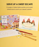 Grabie Quarterly Watercolor Coloring Club with dessert-themed book, watercolor brushes, palette, and painted banana split artwork