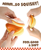 Hands squeezing a soft, colorful stress relief toy named Grabie Ultimate Stress Relief Squishy with a playful design