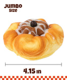 Grabie Ultimate Stress Relief Squishy shaped like a jumbo cinnamon roll with icing and a cherry on top