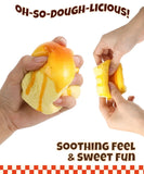 Hands stretching and squeezing the Grabie Ultimate Stress Relief Squishy with a soft, dough-like texture