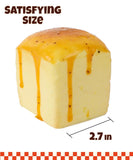 Grabie Ultimate Stress Relief Squishy shaped like a dripping honey block measuring 2.7 inches in size