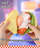 Grabie Ultimate Stress Relief Squishy soft taco-shaped toy being squeezed showing stretchy filling inside