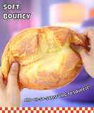 Hands squeezing a soft, bouncy Grabie Ultimate Stress Relief Squishy with a creamy texture visible inside