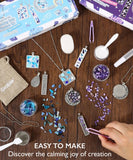 Create Your Own Healing Gem Pendant Kit with colorful gem pieces, pendants, and tools on a wooden surface