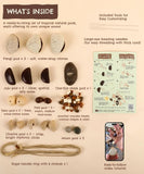 Contents of the Create Your Own Rain Shell Shaker Kit with natural pods, wooden beads, rope, and tutorial materials.